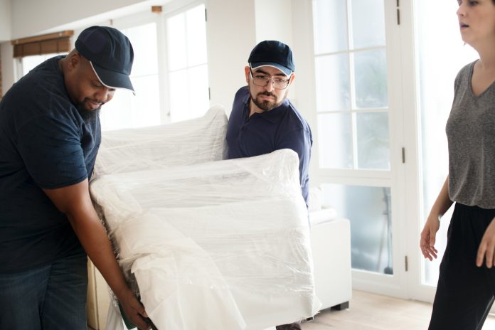 Legal Considerations When Hiring Professional Movers and Vehicle Transport Services